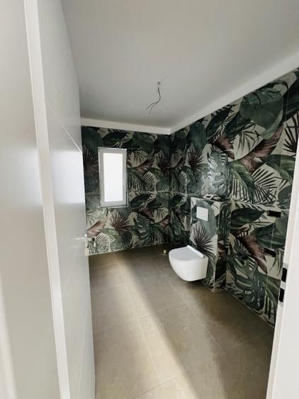 Casă individuală cu 4 camere cu Canalizare în Florești
