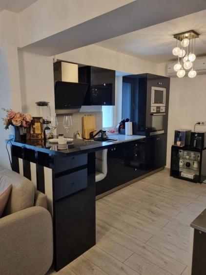 Apartament cu 2 camere decomandat, mobilat în Central