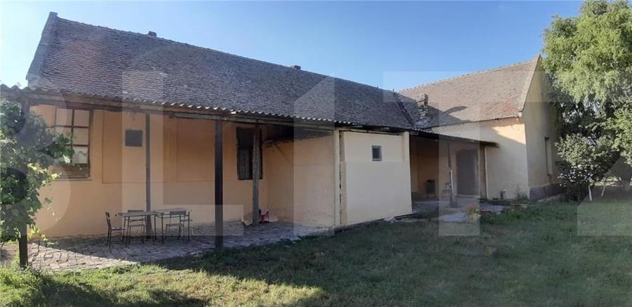 Casă individuală cu 6 camere cu Teren 1400 Mp în Checea