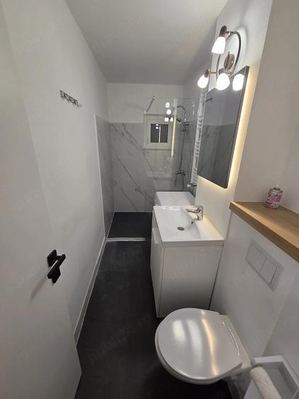 Apartament cu 2 camere decomandat în Răcădău