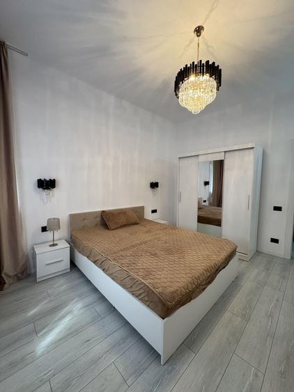 Apartament cu 3 camere decomandat, mobilat în Central
