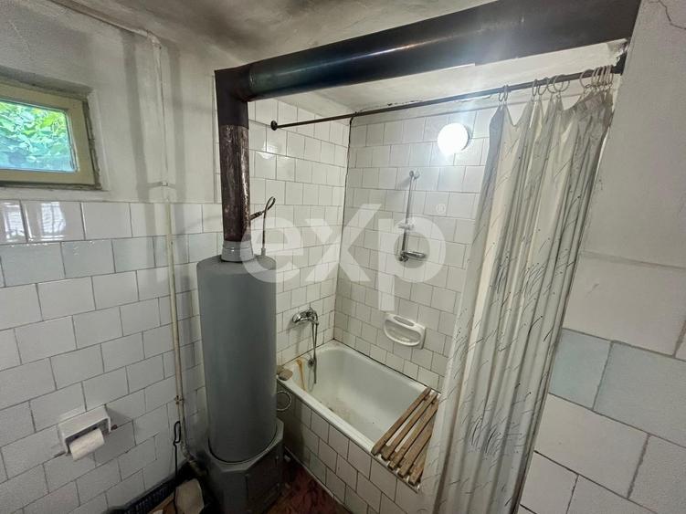 Casă individuală cu 7 camere cu Canalizare în Cuciulata