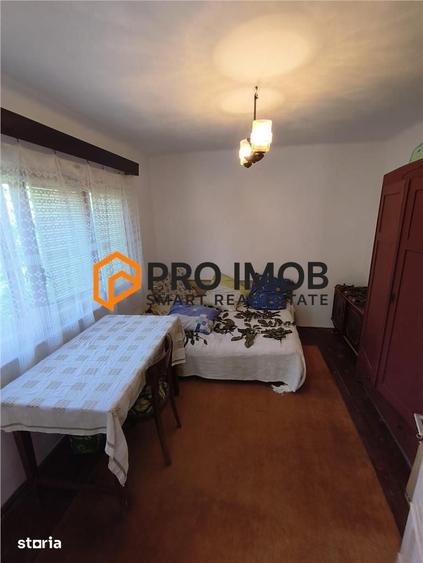 Casă cu 5 camere semidecomandat cu Teren 720 Mp în Gura Dimienii