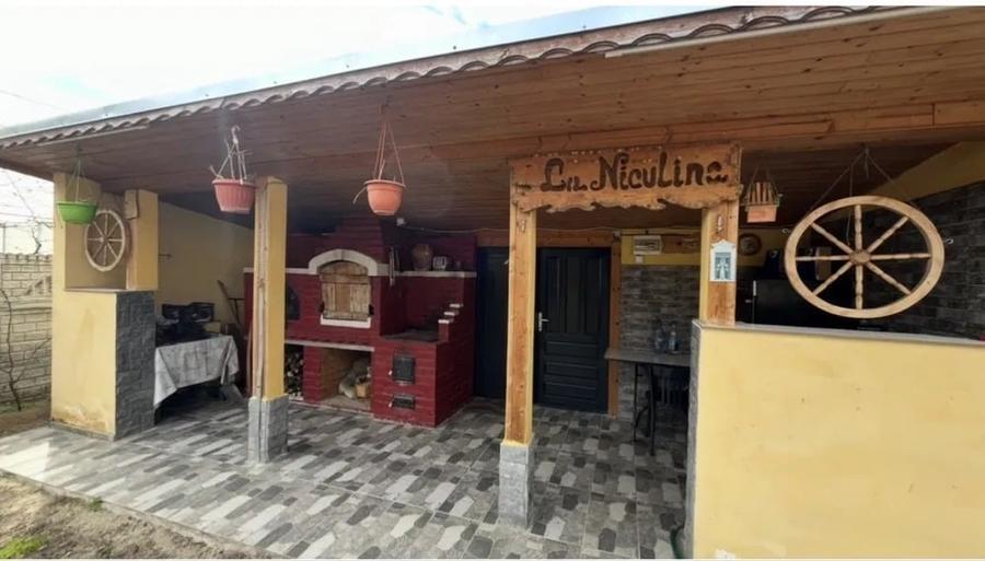 Casă individuală cu 8 camere cu Teren 800 Mp în Sud