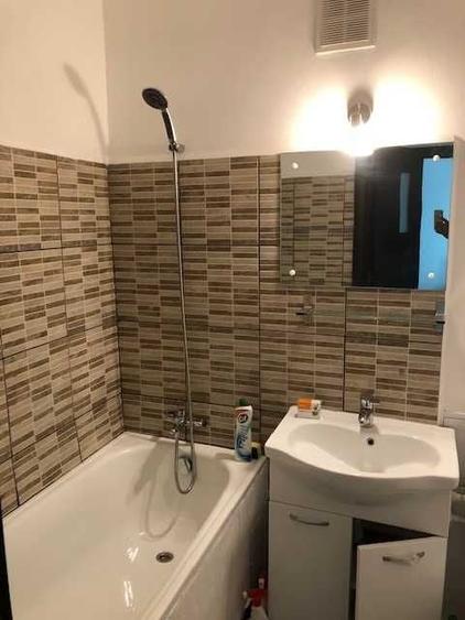 Apartament cu 3 camere decomandat în Titan