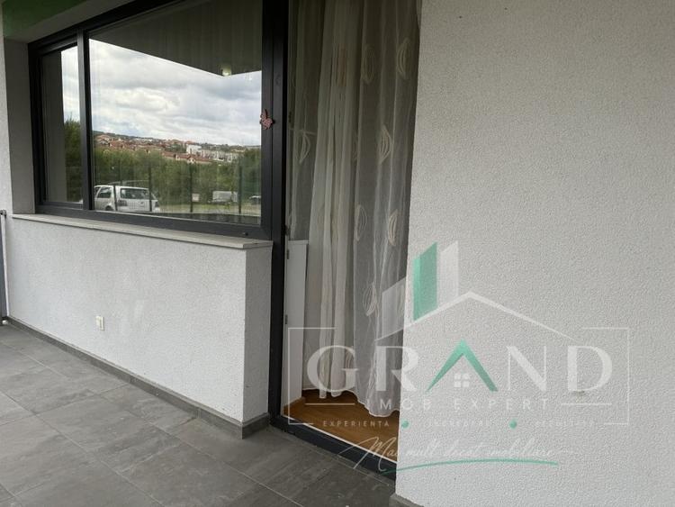 Apartament cu 2 camere semidecomandat, mobilat în Borhanci