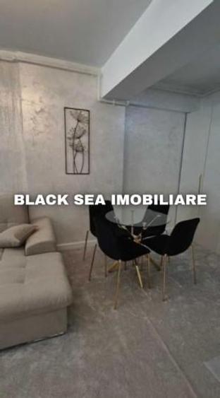 Apartament cu 2 camere, mobilat în Central