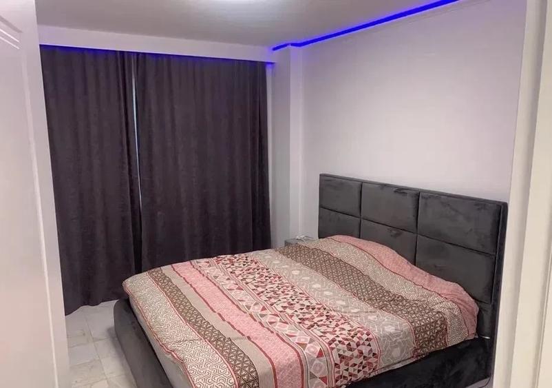 Apartament cu 2 camere semidecomandat, mobilat în Borhanci