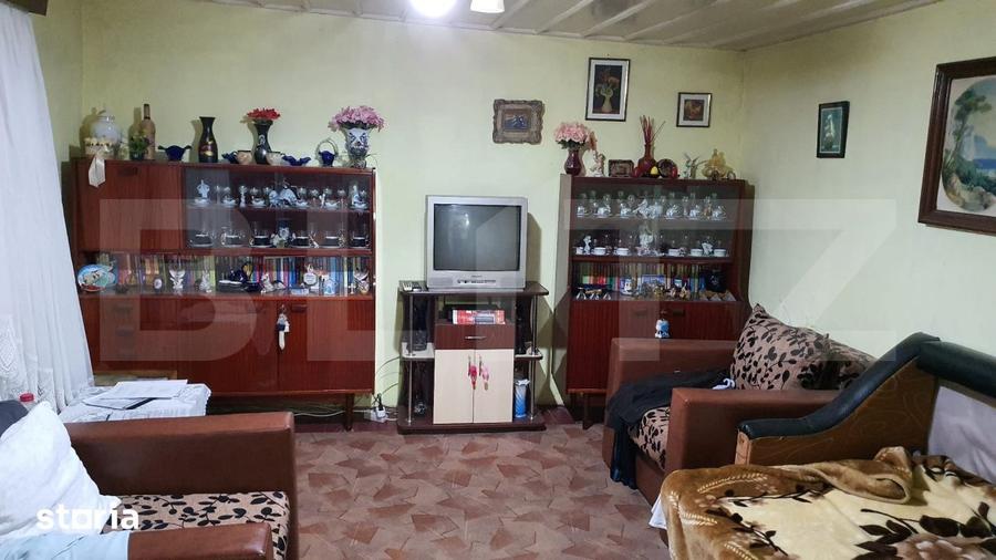 Casă cu 2 camere cu Teren 445 Mp în Piața Centrală