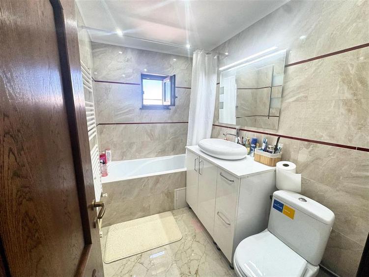 Apartament cu 2 camere semidecomandat, mobilat în Enachiță Văcărescu