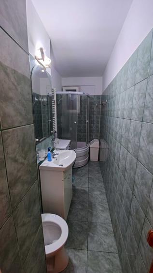 Garsonieră decomandată în Titan