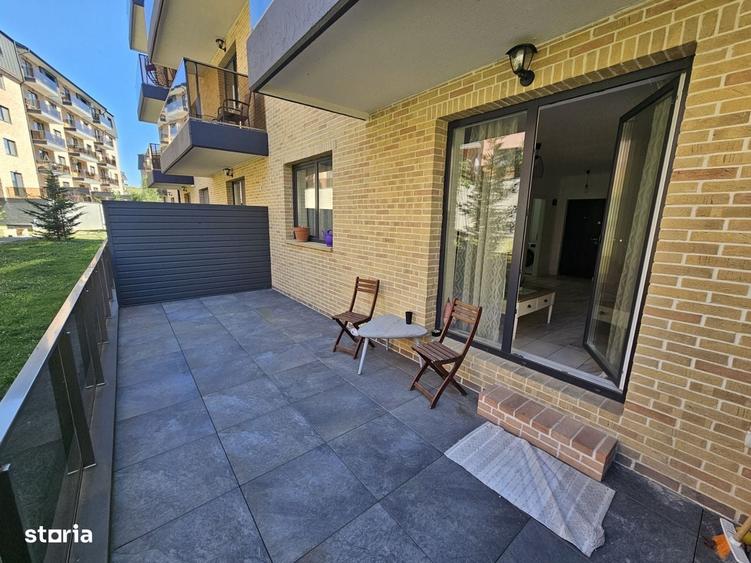 Apartament cu 2 camere semidecomandat în Chinteni