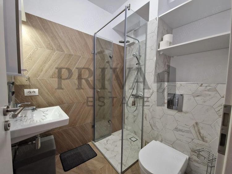 Apartament cu 2 camere semidecomandat, mobilat în Take Ionescu