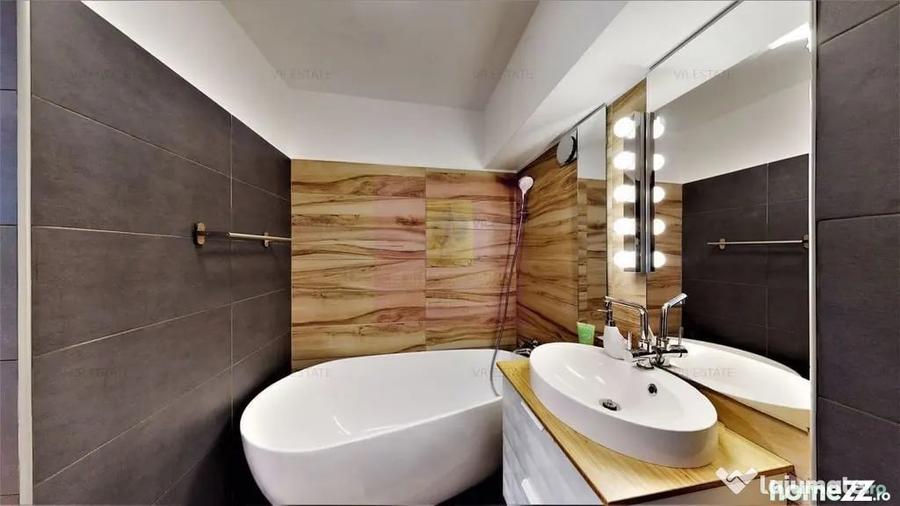 Apartament cu 3 camere semidecomandat în Romană