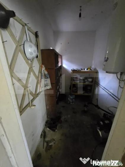 Casă cu 3 camere cu Teren 1500 Mp în Central