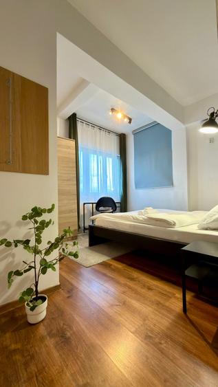 Apartament cu 4 camere decomandat, mobilat în Universitate