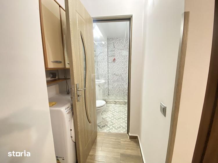 Apartament cu 2 camere semidecomandat, mobilat în Rahova
