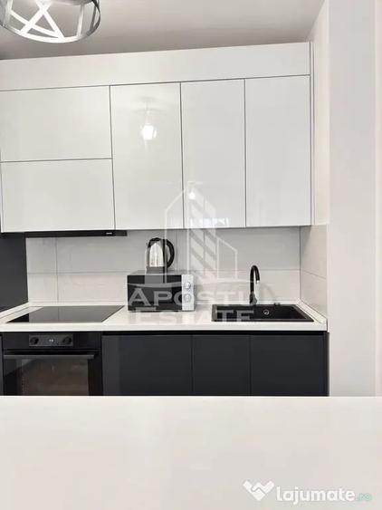 Apartament cu 2 camere semidecomandat, mobilat în Central