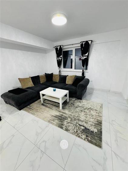 Apartament cu 2 camere semidecomandat, mobilat în Calea București