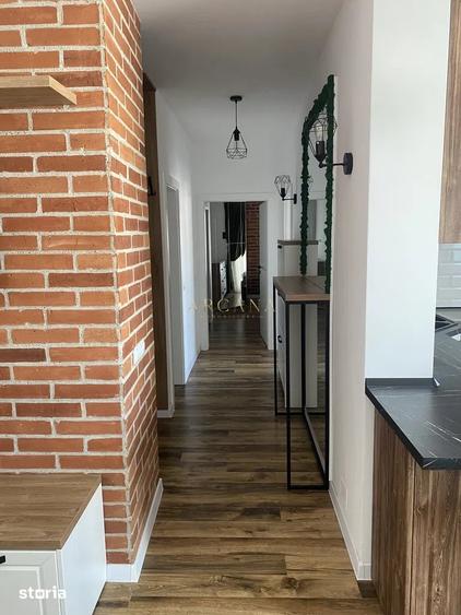 Apartament cu 3 camere semidecomandat, mobilat în Borhanci