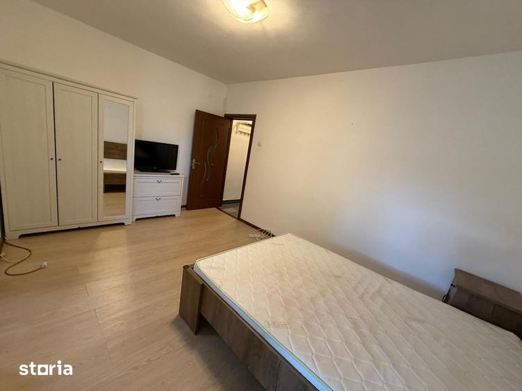 Garsonieră decomandată în Titan