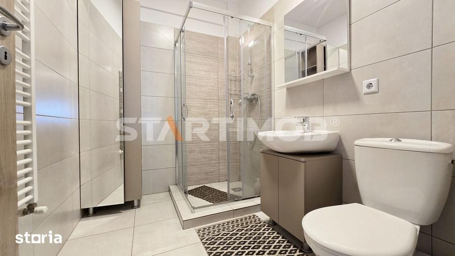 Apartament cu 3 camere decomandat în Tractorul