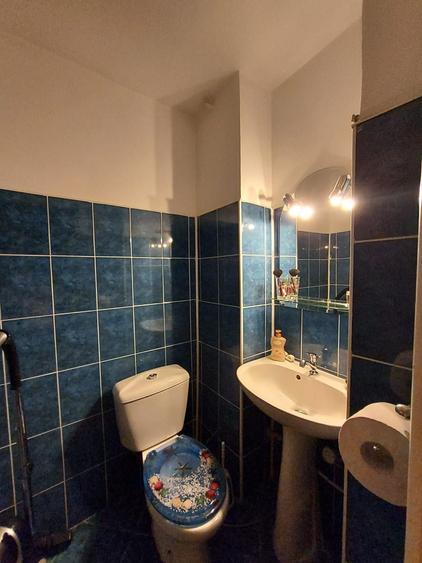 Apartament cu 3 camere decomandat în Coman