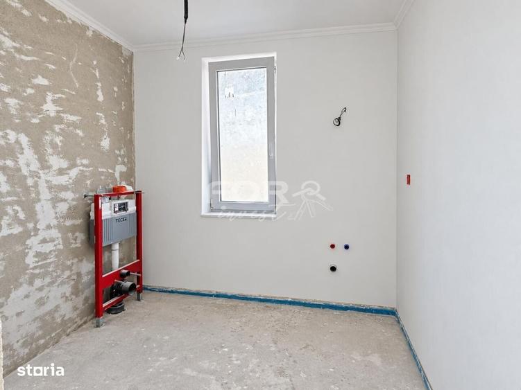 Casă cu 4 camere cu Teren 500 Mp în Central