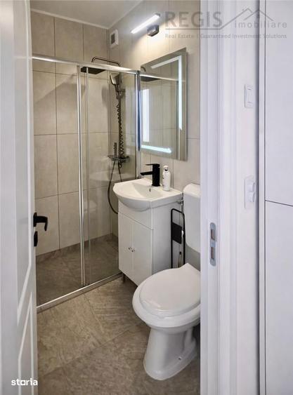 Apartament cu 2 camere semidecomandat, mobilat în Tractorul
