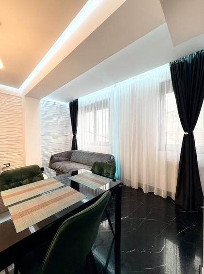 Apartament frumos amenajat de inchiriat cu centrala si parcare - 4