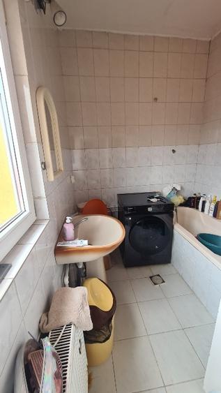 Casă individuală cu 4 camere cu Teren 120 Mp în Central