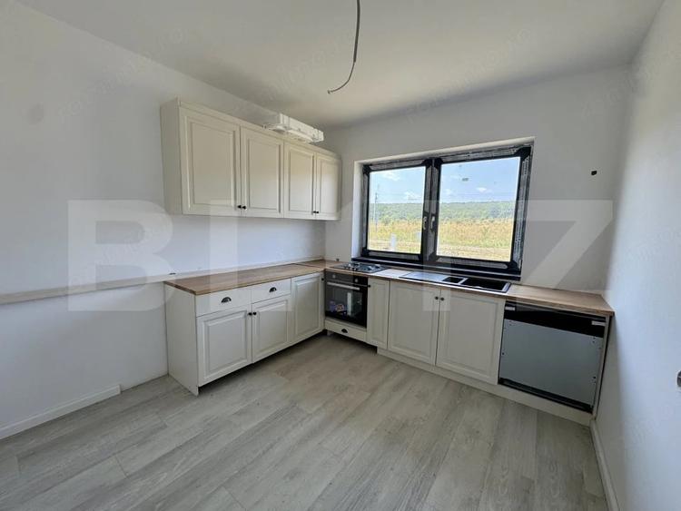 Casă cu Teren 528 Mp în Corunca