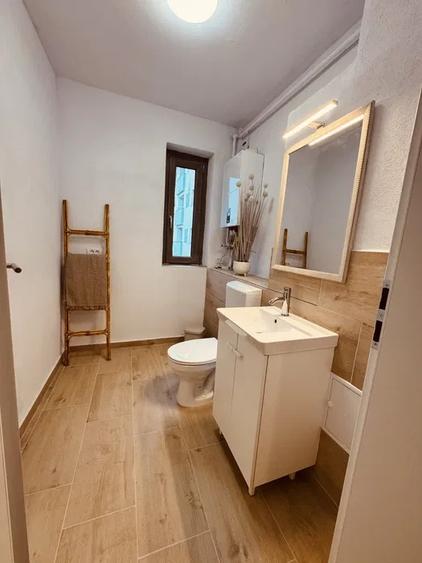 Apartament cu 3 camere semidecomandat, mobilat în Borhanci