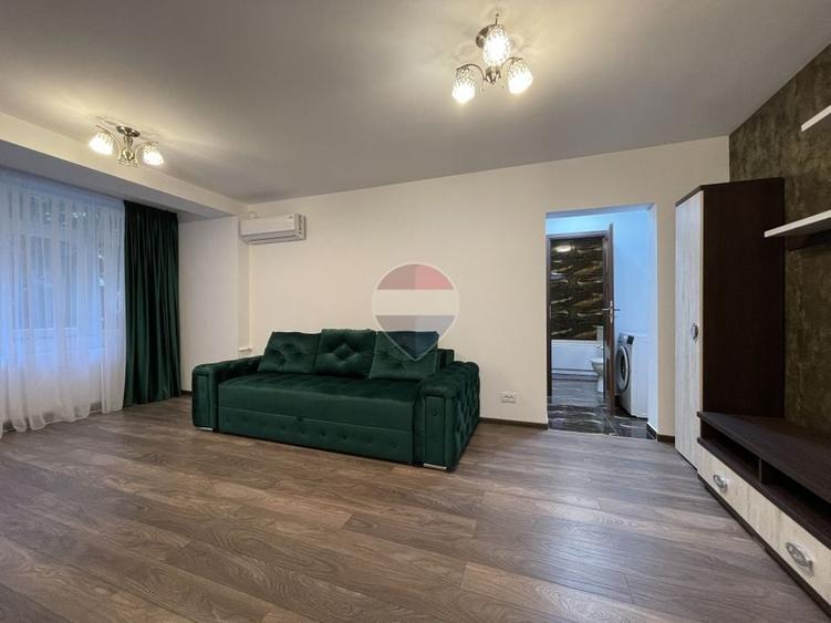 Apartament cu 2 camere semidecomandat, mobilat în Olteniței