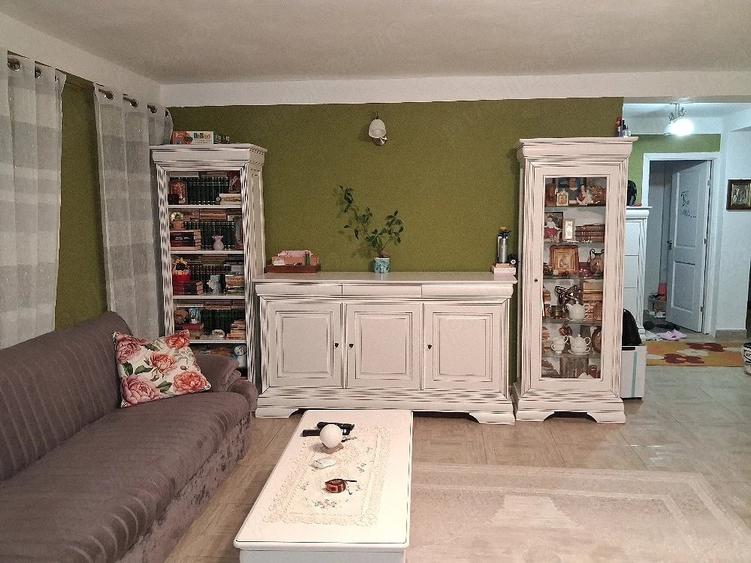 Casă cu Teren 1500 Mp în Preajba