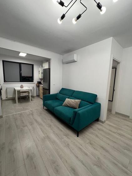 Apartament cu 2 camere semidecomandat în Cățelu
