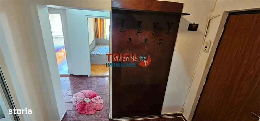 Apartament complet decomandat, 3 camere, 2 bai si garaj inclus