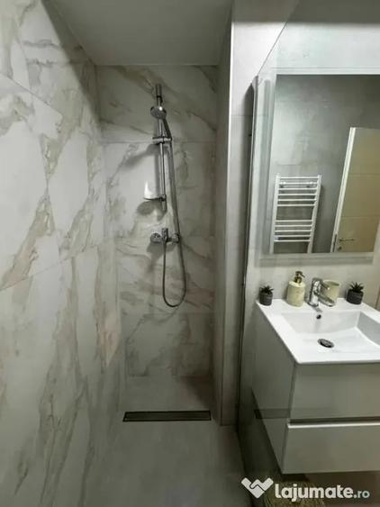 Apartament cu 3 camere decomandat în Bucium