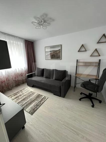 Apartament cu 2 camere semidecomandat, mobilat în Chinteni