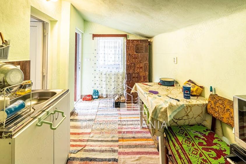 Casă cu Teren 1425 Mp în Năsal