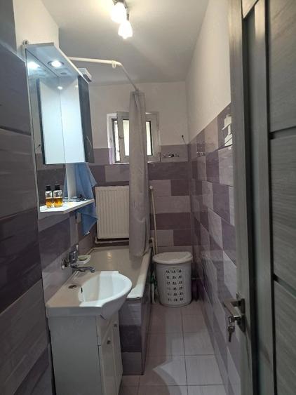 Apartament cu 2 camere semidecomandat în Cuza Vodă