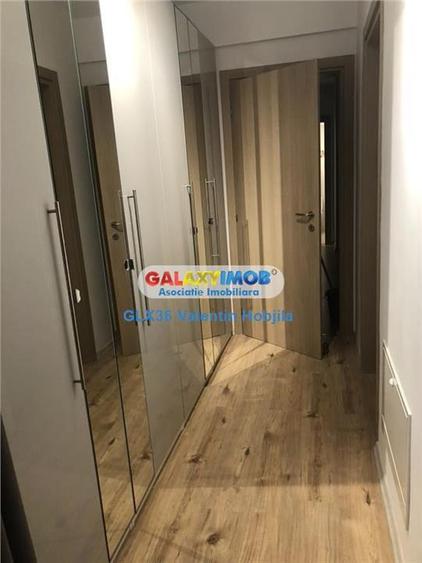 Apartament cu 3 camere semidecomandat, mobilat în Băneasa