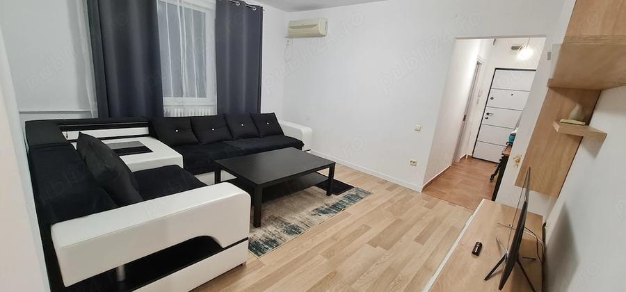 Apartament cu 3 camere semidecomandat în Gara de Nord