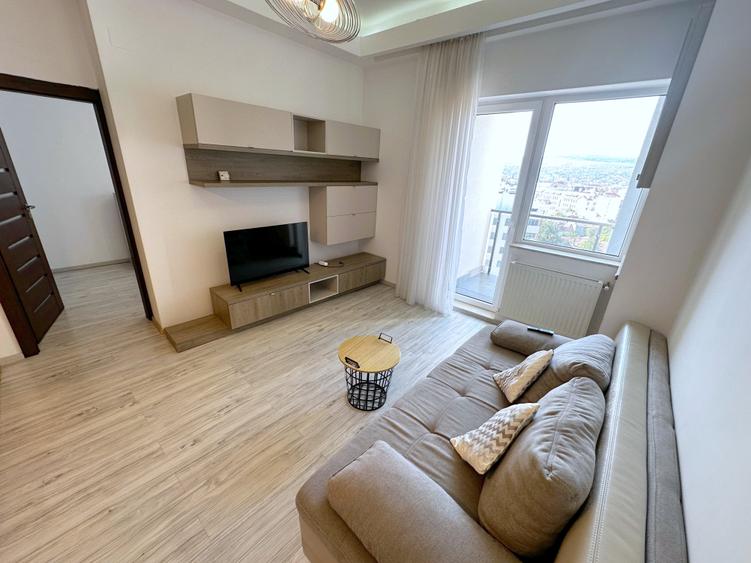 Apartament cu 2 camere semidecomandat, mobilat în Central