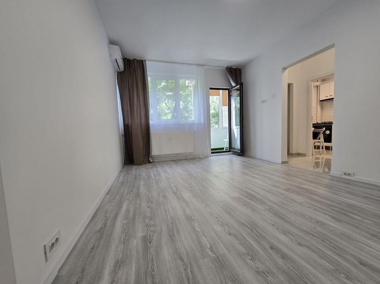 Apartament cu 2 camere semidecomandat, mobilat în 1 Mai