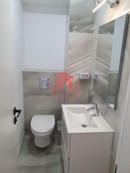 Apartament cu 3 camere decomandat în Romană