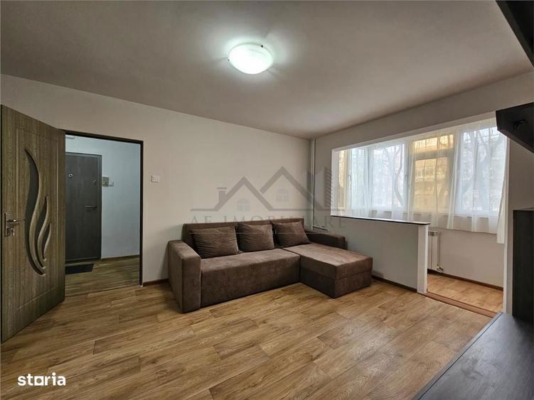 Apartament cu 2 camere semidecomandat, mobilat în Podu Roș
