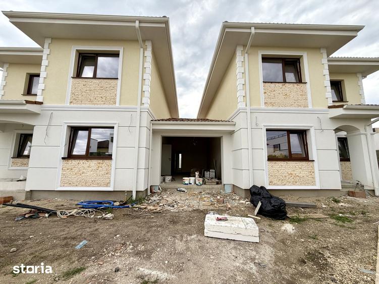 Duplex despartit prin garaj, 4 camere, 108 mp utili - Dumbravita - 1