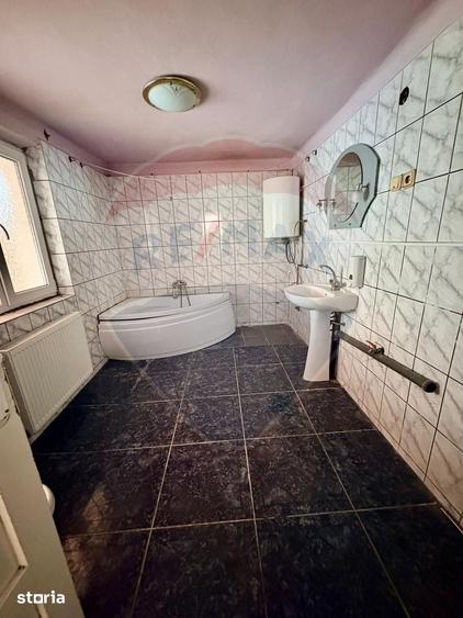 Casă cu 4 camere cu Teren 292 Mp în Central