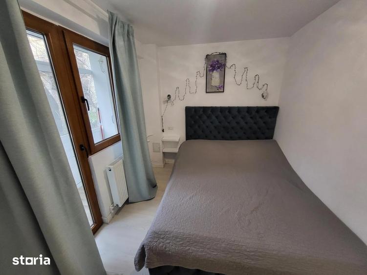Apartament cu 2 camere semidecomandat, mobilat în P-ța Victoriei